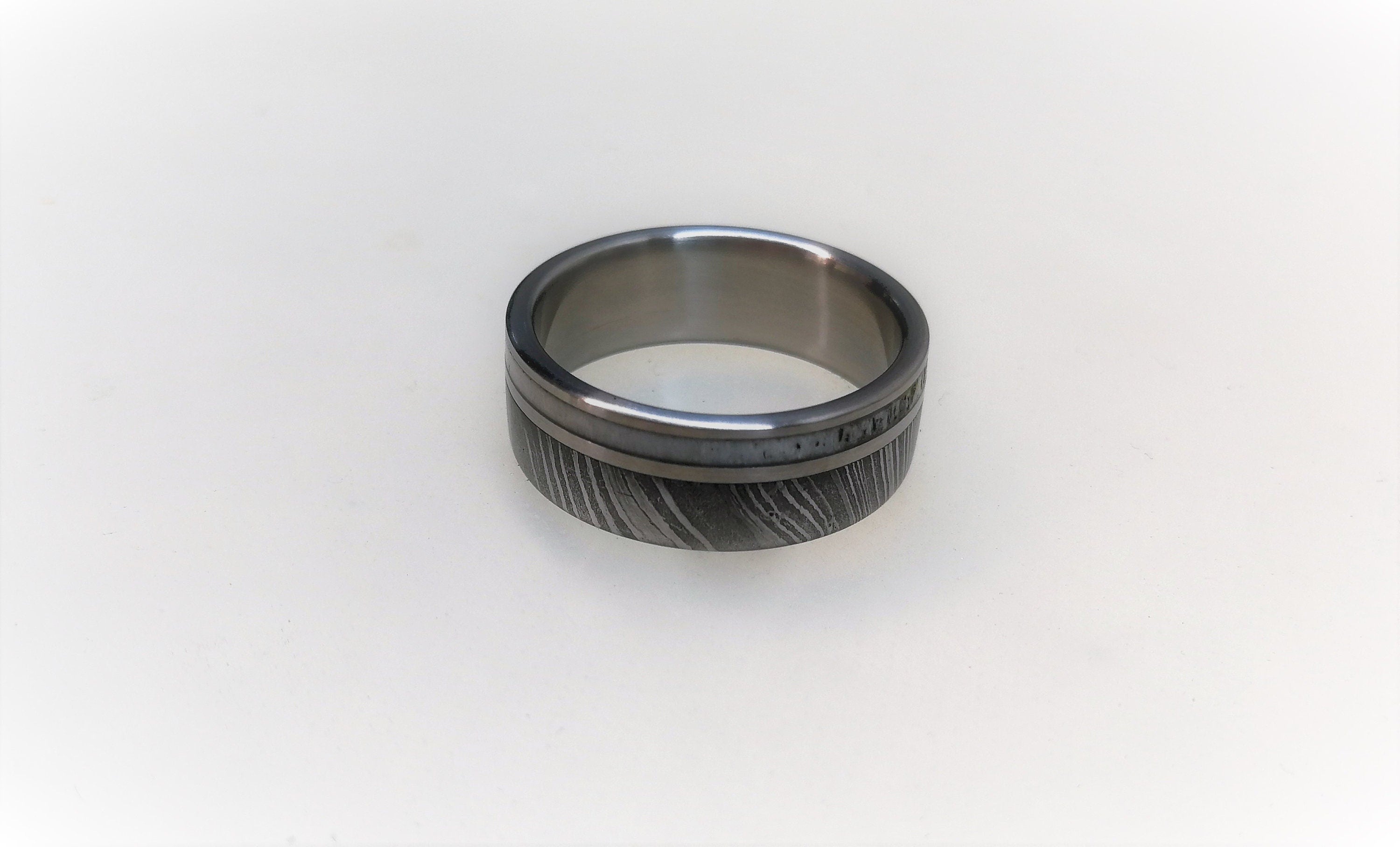 Damascus Steel Wedding Band: Titanium Ring with Deer Antler Inlay